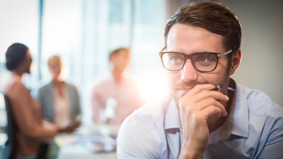 Thoughtful man with hand on chin